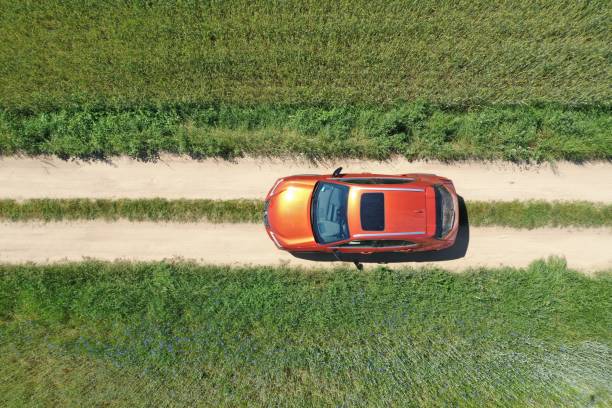 Lexus UX 250h between the fields from the top stock photo