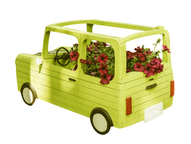istock wooden decorative car with flowers isolated 1153938964
