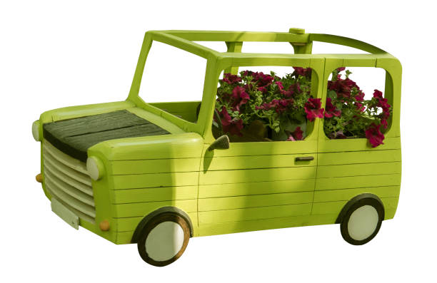 istock wooden decorative car with flowers isolated 1153939286