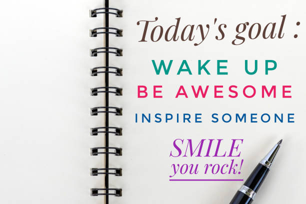 istock Todays Goals list on white paper background. 1153939715