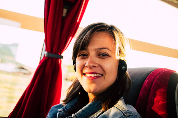 istock Woman used smiling inside bus 1153941142