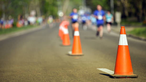 istock Pylon cones during a marathon with runners 1153943164