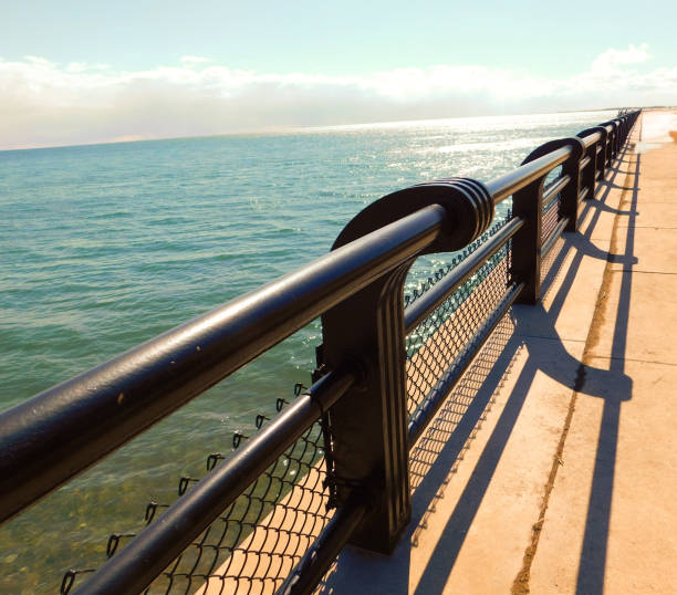 istock Fenced Pier Overlooking Lake Ontario 1153944537