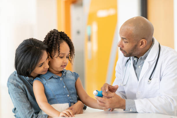 istock Diabetic child at doctor's appointment with her mother 1153954404