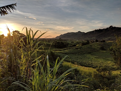 Sunset upon the green and lush Sabeto Valley in Fiji