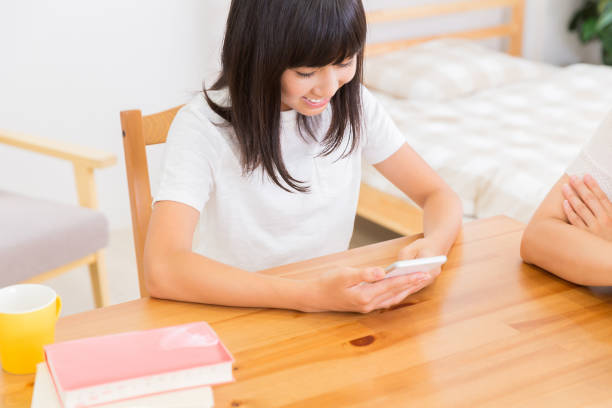 istock asian parent and daughter 1153963246
