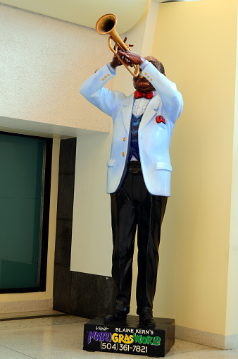 New Orleans, LA, USA October 27, 2015 A statue of jazz legend Louis Armstrong greets visitors at the New Orleans International Airport
