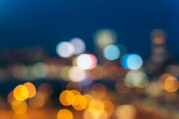 istock Light night city bokeh abstract background 1153965842