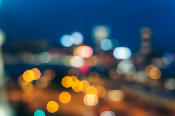 istock Light night city bokeh abstract background 1153965850