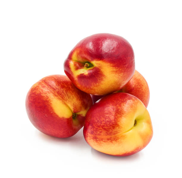 istock Ripe nectarine  isolated on white background. 1153970274