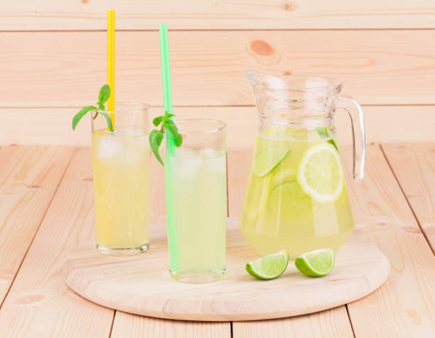istock Still life with glass pitcher full of lemonade. 1153981568