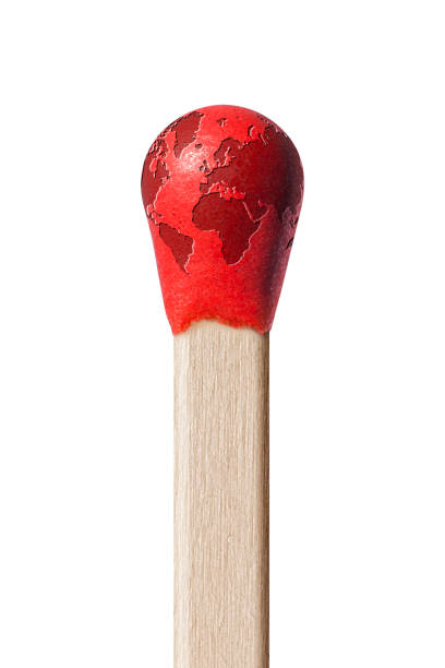 Global warming. Globe match on white background. Global warming. Earth globe on the match. desktop globe stock pictures, royalty-free photos & images