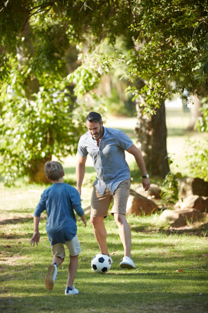 istock Who better to learn about football than dad 1153987944
