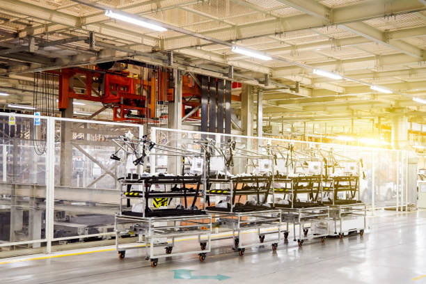 istock Automatic trucks that are transporting materials in the factory production workshop 1153989775