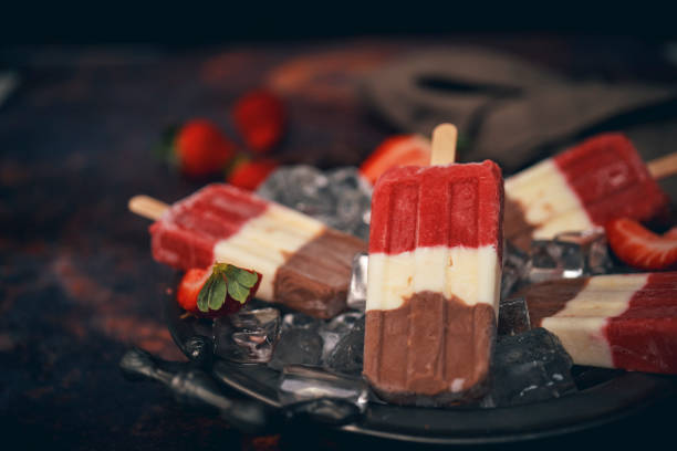 istock Strawberry, Chocolate, Yogurt Ice Cream on Stick 1153990984
