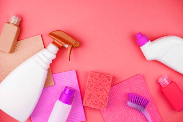 istock House cleaning products are on pink background. 1153991337