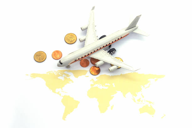 istock Airplane and world map on white blackground, Travel concept 1153998859