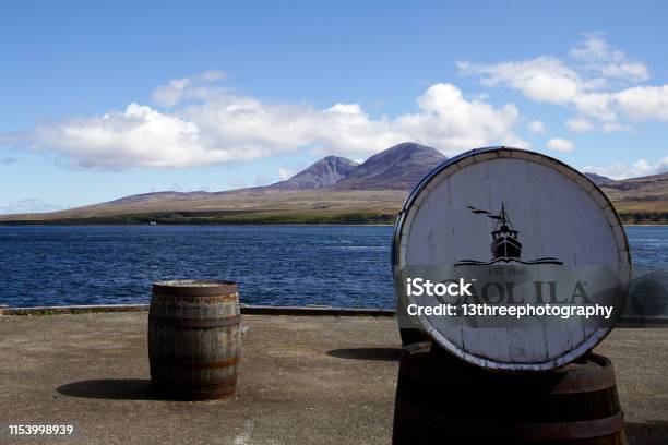 Caol Ila Port Askaig Islay Scotland May 11 2019 The Pier Of The Caol Ila Whisky Distillery Stock Photo - Download Image Now