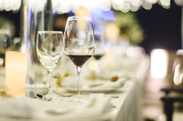 istock Table setting at a luxury wedding and Beautiful flowers on the table. 1154012906