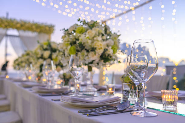 istock Table setting at a luxury wedding and Beautiful flowers on the table. 1154012991