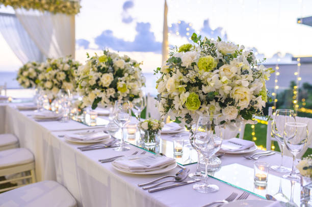 istock Table setting at a luxury wedding and Beautiful flowers on the table. 1154013365