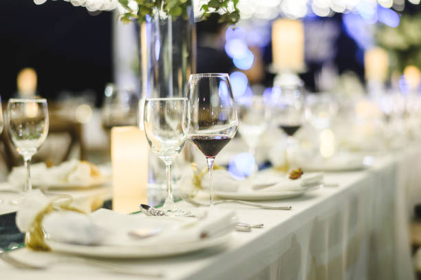 istock Table setting at a luxury wedding and Beautiful flowers on the table. 1154015462