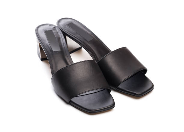 istock Womans summer  leather sandals isolated on white background - Image 1154016078