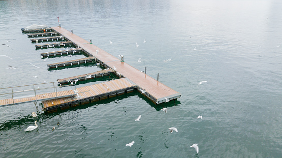 Empty decks side by side in a lake