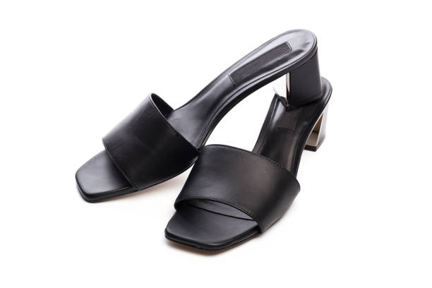 istock Womans summer  leather sandals isolated on white background - Image 1154017252