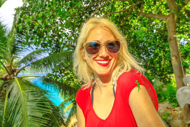 istock Woman with Seychelles Gecko 1154021008