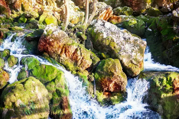 Photo of Waterfalls cascaded down through rocks