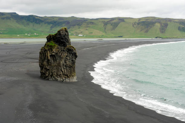 istock Reynisfjara black sand beach, Iceland 1154022760