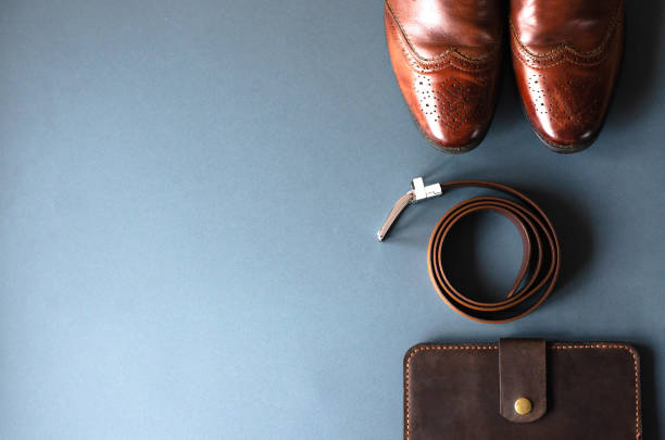 istock Flat lay with men's accessories on a gray stylish background. 1154027089