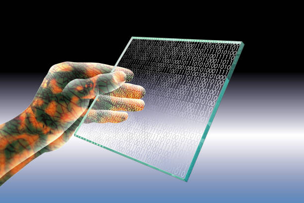 istock Cyborg's hand holding a transparent computer tablet with a glass in one hand. Screen is binary code. 1154031795