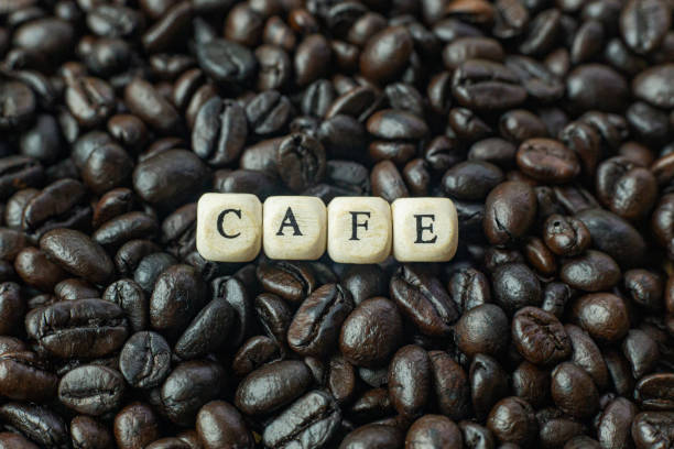 istock coffee roasted and text wood cube close up image. 1154031968