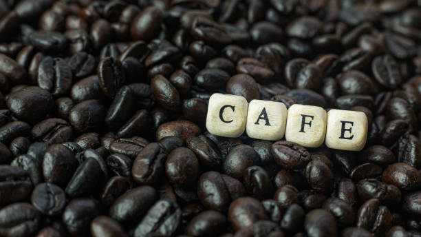 istock coffee roasted and text wood cube close up image. 1154032058