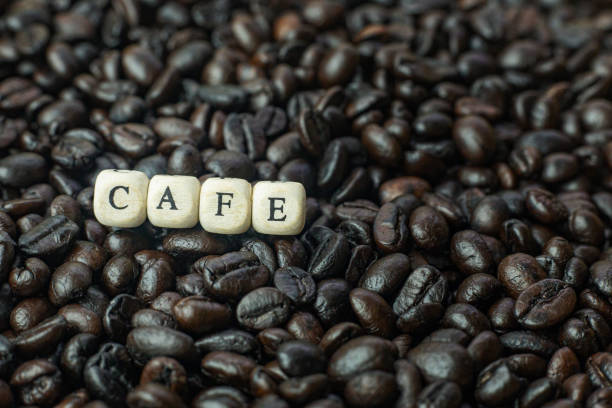 istock coffee roasted and text wood cube close up image. 1154032192