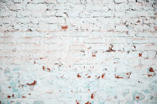 istock Background of old vintage dirty brick wall texture 1154032348