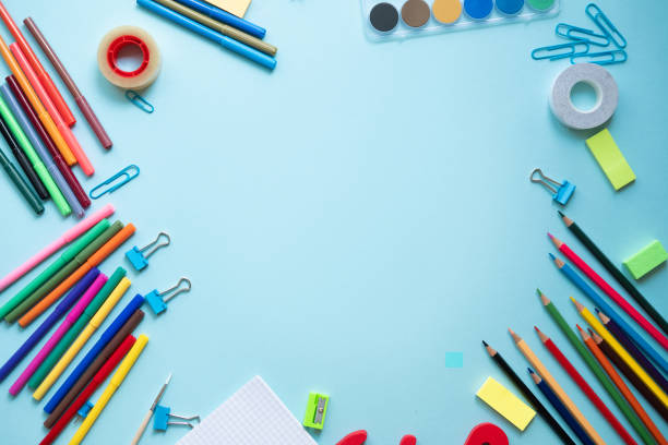 istock Various school accessories on blue board with copy space. Concept back to school. 1154035982