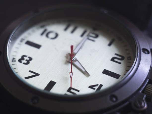 istock Black and white man watch close up 1154036965