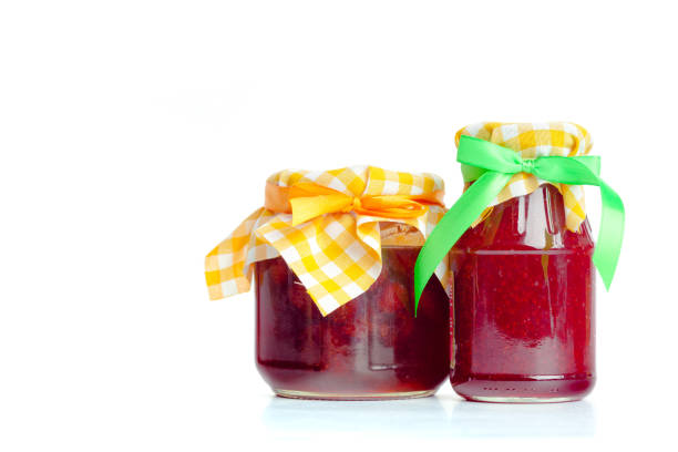 istock Glass jar with  jam isolated on the white background 1154037220