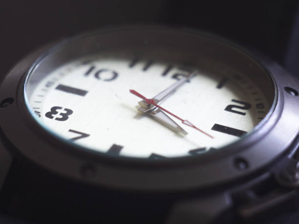 istock Black and white man watch close up 1154037351