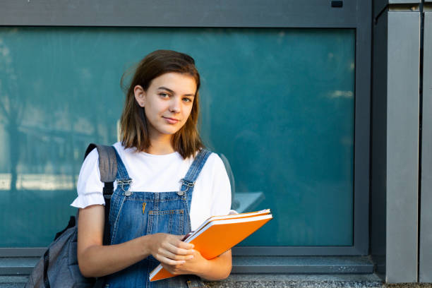 istock Beautiful student girl portrait 1154037356