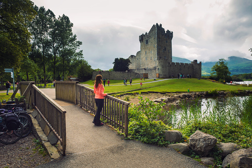 Killarney, Ireland - August 2, 2018 : Path and footbridge leading to Ross Castle in the Killarney National Park, Ireland.