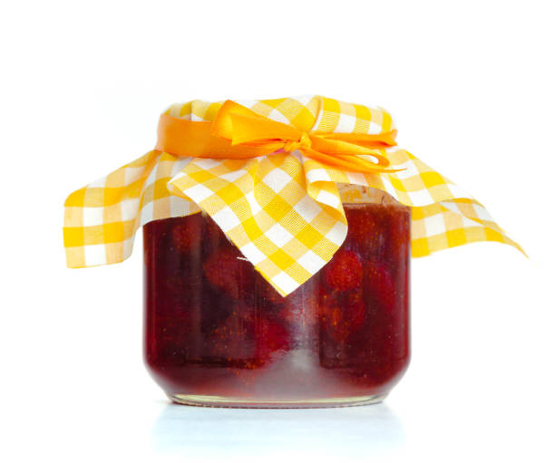 istock Glass jar with  jam isolated on the white background 1154038907