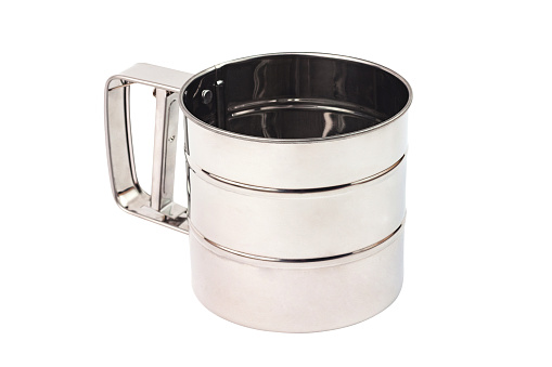 One empty cylindrical stainless mug with mechanical rotary sieve and handle with trigger isolated on white background