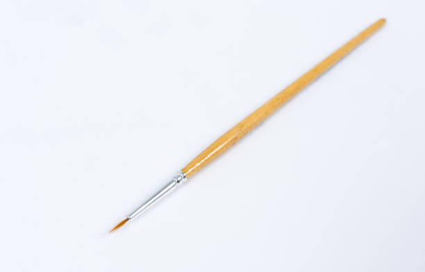 istock Painting brushes. Drawing tools, paint brushes on white background, copy space, top view 1154039317