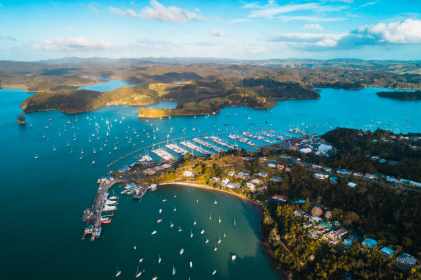 Overlooking Bay of Islands, with ferry terminal to New Zealand. Opua Ferry terminal, Bay of Islands, Northland - New Zealand. bay of islands new zealand stock pictures, royalty-free photos & images
