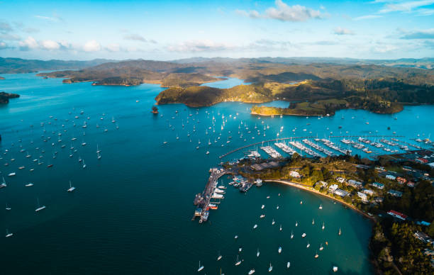 Overlooking Bay of Islands, with ferry terminal to New Zealand. Opua Ferry terminal, Bay of Islands, Northland - New Zealand. bay of islands new zealand stock pictures, royalty-free photos & images