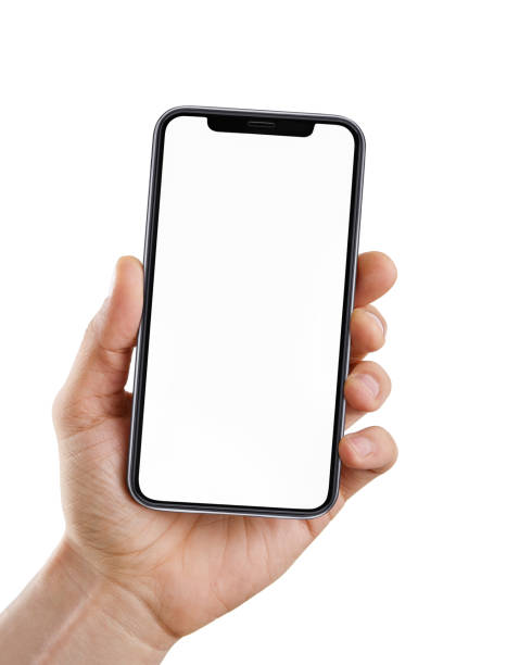 Hand with blank smart phone isolated on white Male hand holding blank smart phone isolated on white background with clipping path for the screen Human Hand stock pictures, royalty-free photos & images